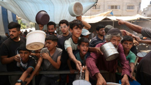 Gaza civil defence says Israeli attacks kill 26 near two aid centres