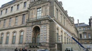 Two more suspects including woman charged over Louvre heist