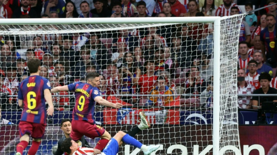 Lewandowski claims leaders Barca vital Liga win at Atletico