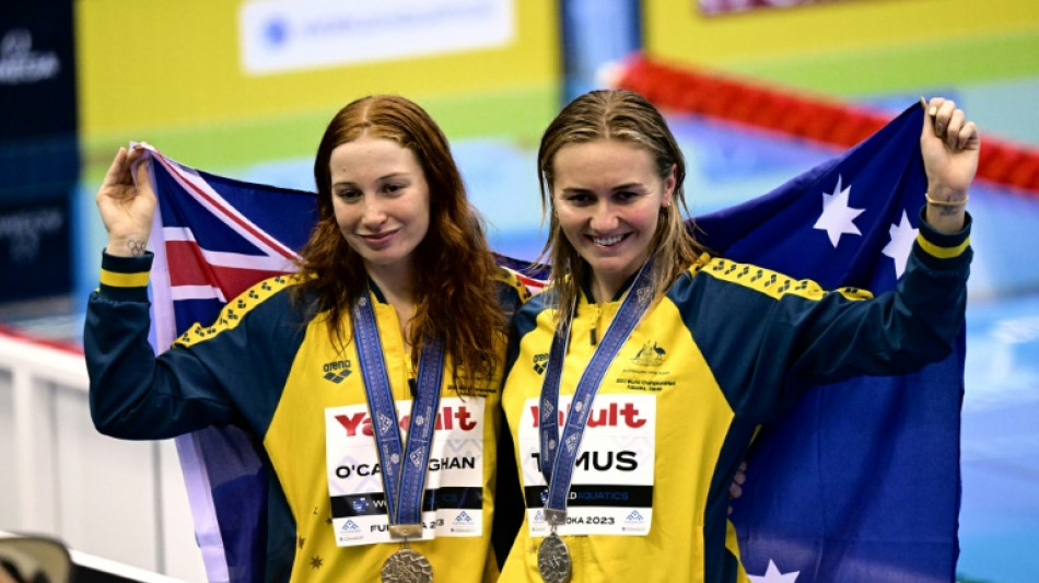 O'Callaghan breaks record as Marchand adds more swimming gold