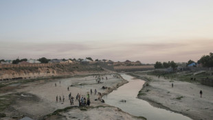 Home in Nigeria, ex-refugees find themselves in a war zone