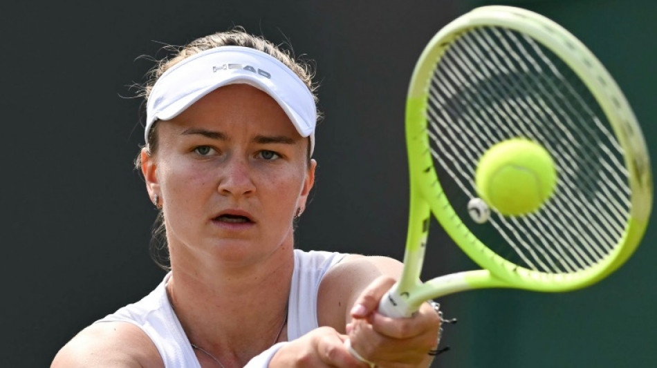 Defending champion Krejcikova battles into Wimbledon third round