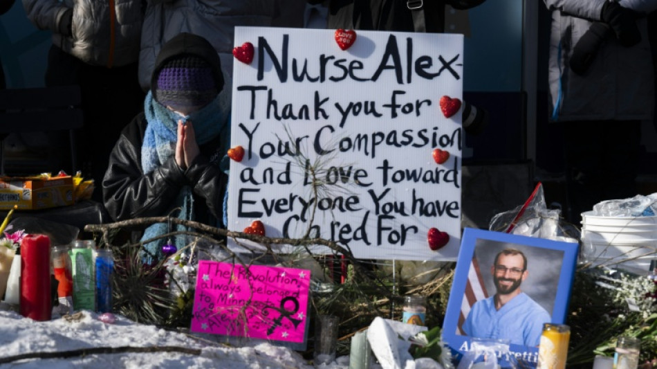 "Triste et en col&egrave;re": Minneapolis se recueille dans le froid polaire