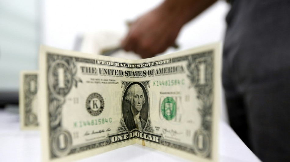 El d&oacute;lar supera por primera vez umbral de los 6 reales en Brasil