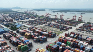 Asian markets mixed as uneasy traders await key data