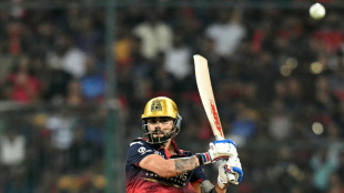 Impact sub Kohli shines as Bengaluru move top of IPL