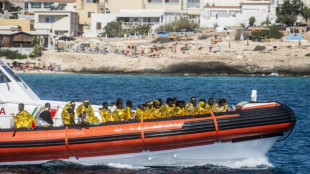 Migrant pressure eases on Italian island as political tensions rise