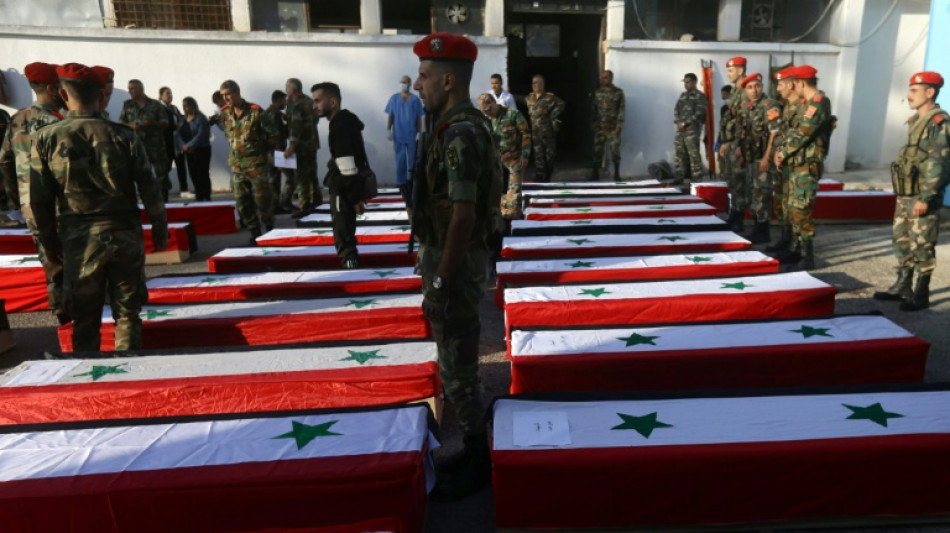 S&iacute;ria enterra seus mortos ap&oacute;s ataque contra academia militar