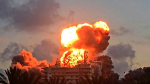 Israeli strike near Beirut as Lebanon says raids kill 14
