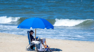 As Trump faces indictment heat, Biden chills beachside