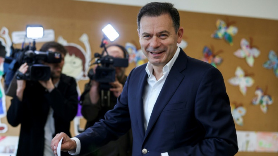 Portugal holds snap election with centre-right leading polls