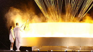 P&eacute;rec e Riner accendono la fiamma e il braciere vola