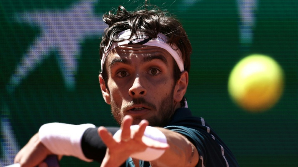 Italy's Musetti battles into French Open last 16