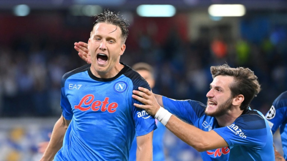 Napoli thump troubled Liverpool in stunning Champions League return