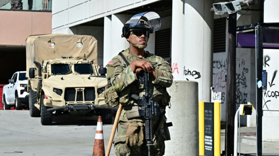 Curfew lifted in LA as Trump battles for control of California troops