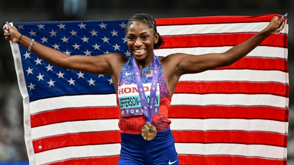 Jefferson-Wooden surges to women's 100 metres world title
