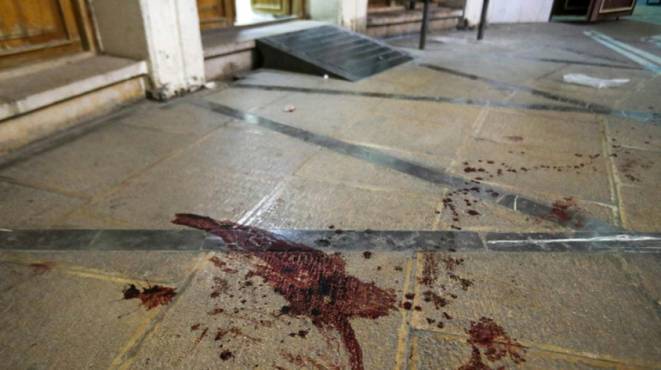 Iran arrests 8 'foreigners' after fatal shooting at Shiite shrine