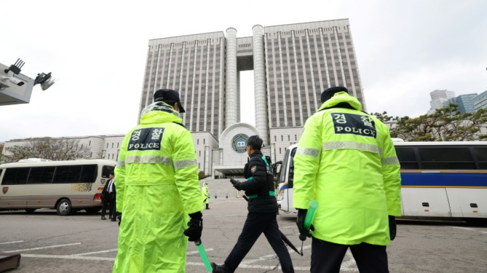 South Korea's ex-president attends first day of criminal trial