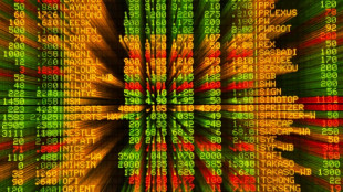 Crude edges up after wild swing, stocks track Wall St rally