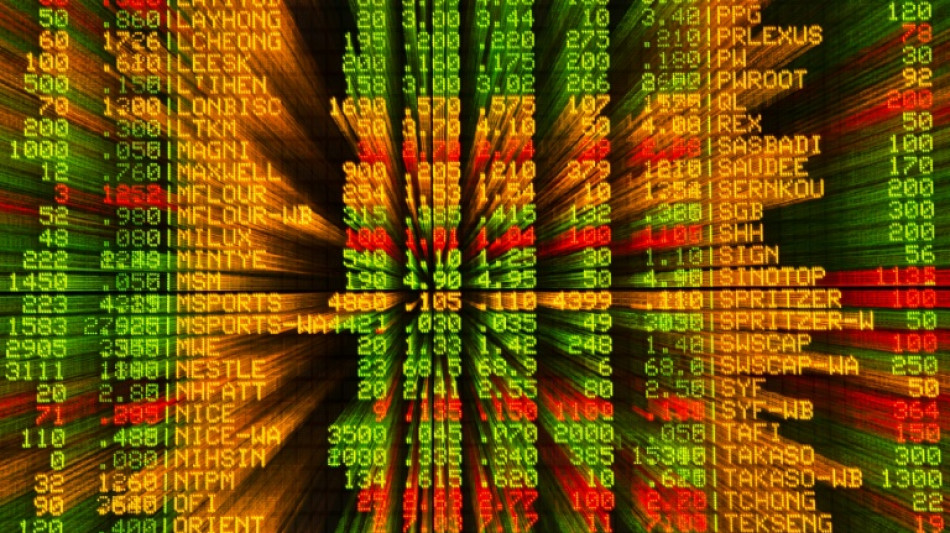 Stocks diverge, dollar gains before tech earnings, Fed decision