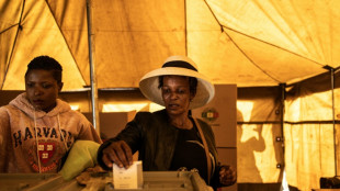 Zimbabweans vote in tense poll as president seeks new term