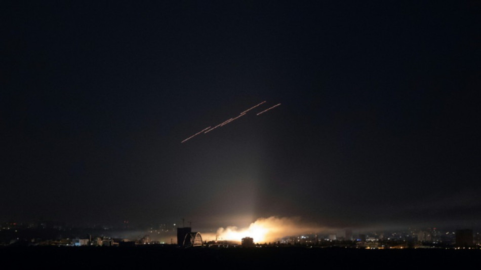 Wave of Russian drones, missiles kills two in Kyiv