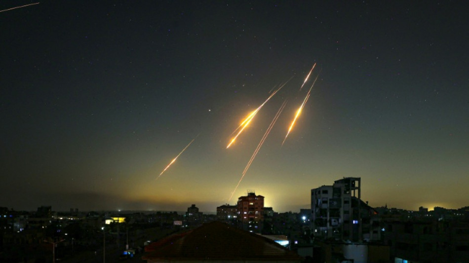 Iran launches missile barrage as Israel strikes Tehran