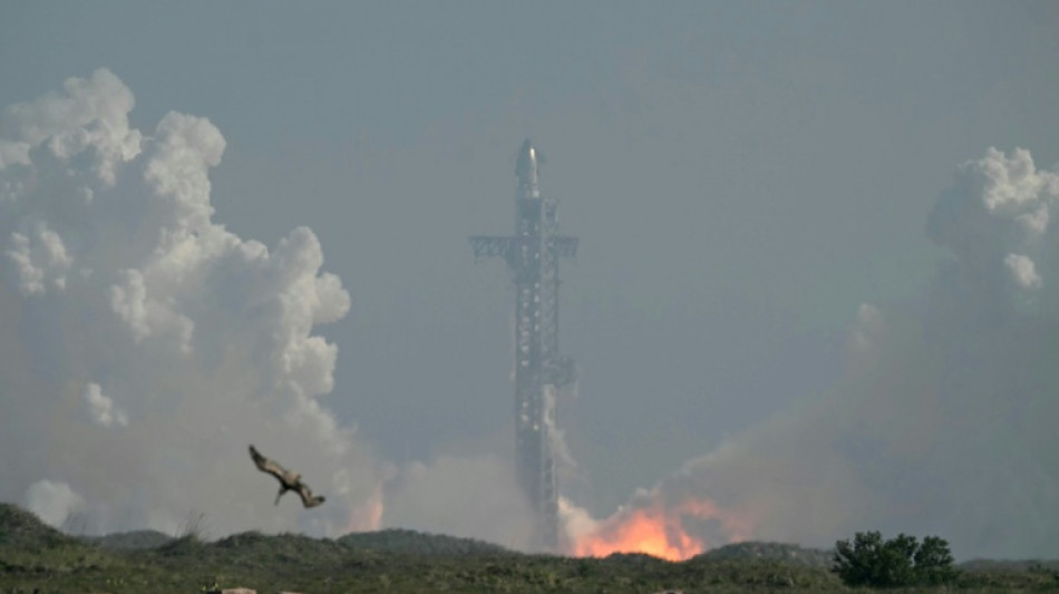 SpaceX's enormous Starship splashes down after test flight