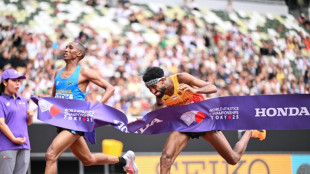 Simbu dips past Petros for world marathon gold