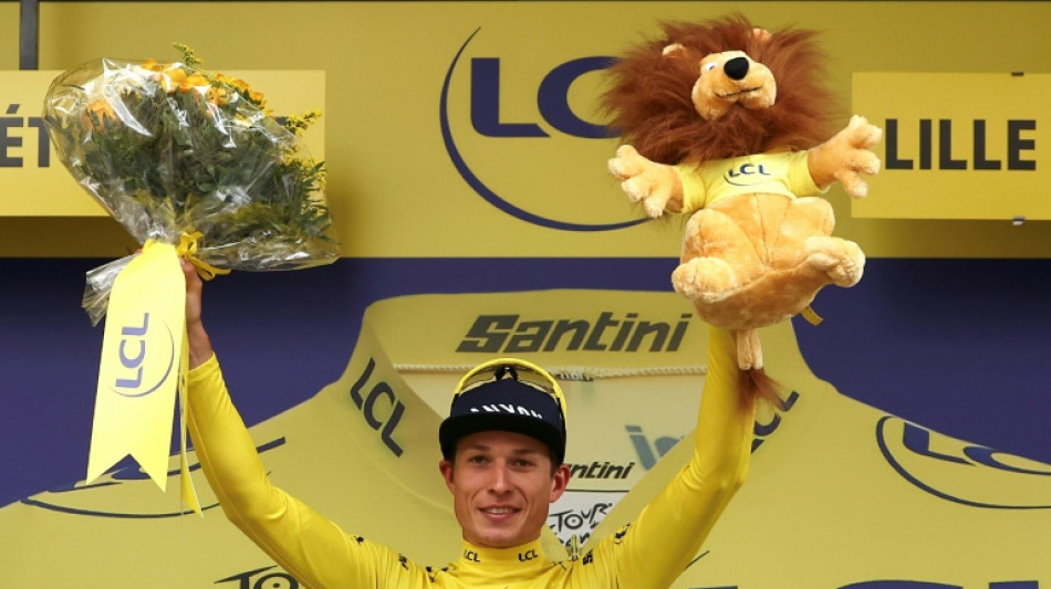 Philipsen wins windy Tour de France opener as Evenepoel trapped in split