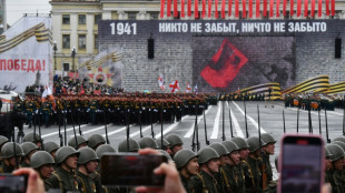 Xi meets Putin in Moscow as Ukraine reports truce violations