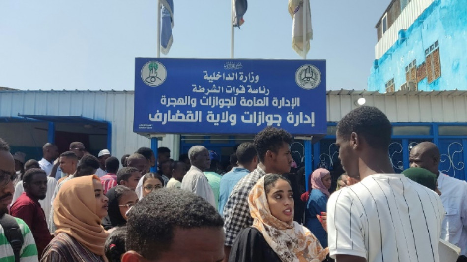 Desperate Sudanese face endless wait for passports so they can flee
