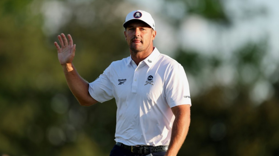 DeChambeau surges late to line up Masters showdown with McIlroy