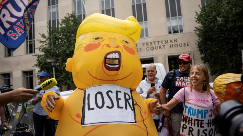 Defiant Trump heads to court to face election conspiracy charges