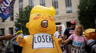 Defiant Trump heads to court to face election conspiracy charges