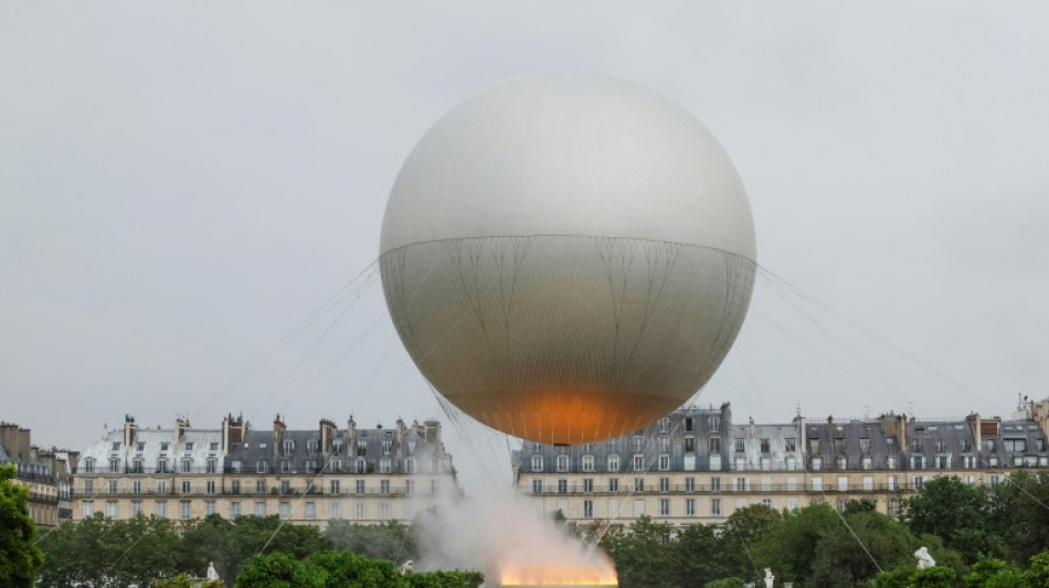 Autour de la vasque olympique, la "f&ecirc;te" et la "communion" des Jeux