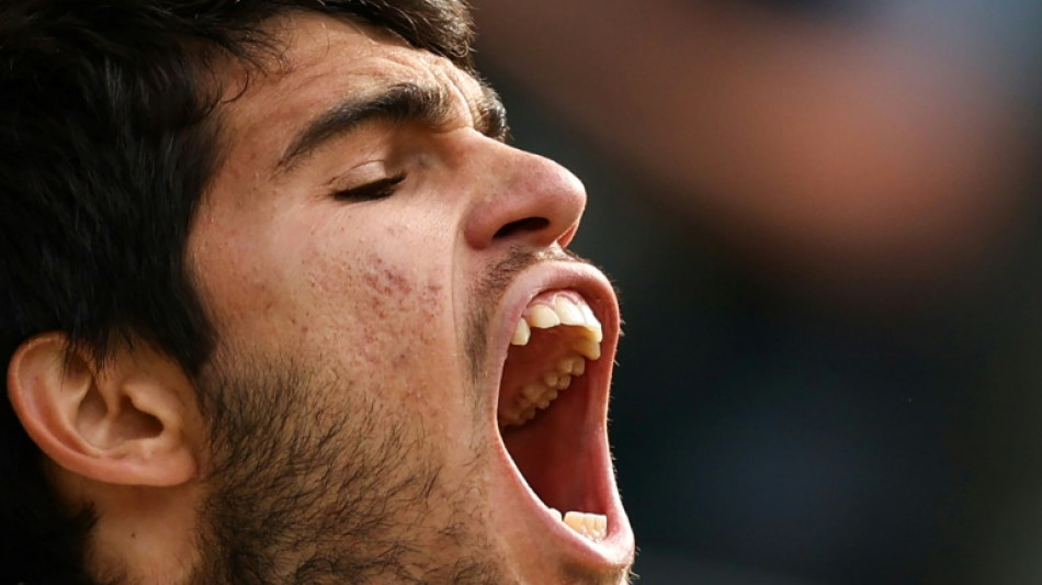 Alcaraz beats Djokovic in five sets to win first Wimbledon title