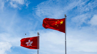 Wanted Hong Kong activist says parents 'harassed, intimidated'