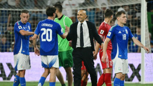 Belgium battle past Wales, Italy win in World Cup qualifying