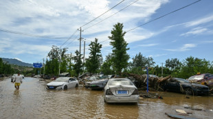 Beijing lifts rain alert after evacuating over 80,000