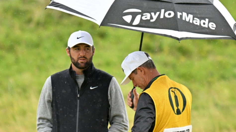 Soaked Scheffler battles elements to make solid British Open start