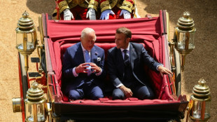 King Charles, Macron stress unity on first day of French president's state visit 