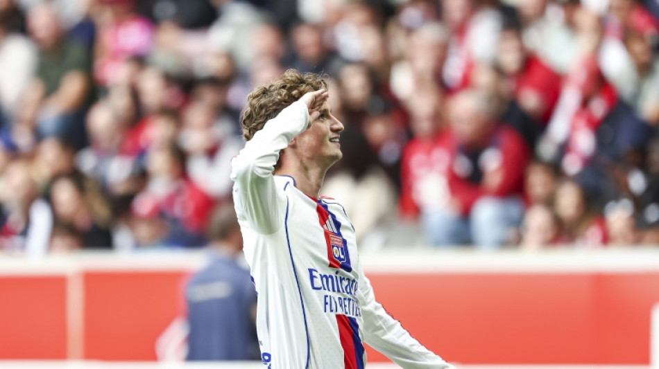 Lyon win at Lille to stay level at top of Ligue 1 with PSG