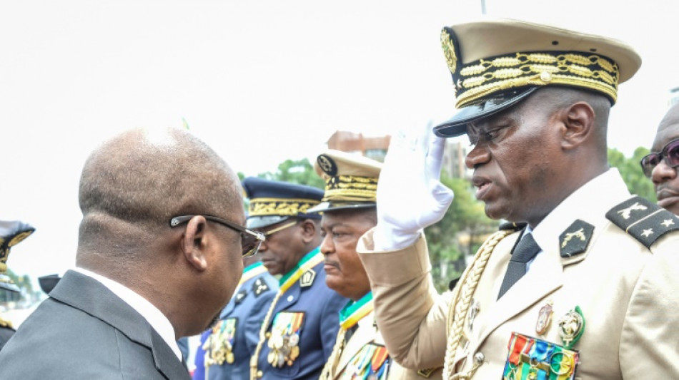 Gabon coup leader sworn in as interim president 