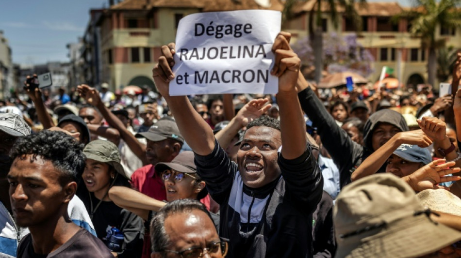 Madagascar president hangs on to power as thousands protest