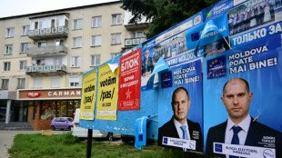 Moldovans torn between pro-EU and pro-Russia vote in tense polls