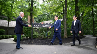 Biden salutes 'new era' of united Japan, S.Korea in face of China