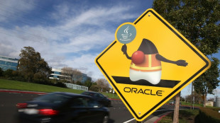 Dow, S&P 500 end at records despite AI fears 