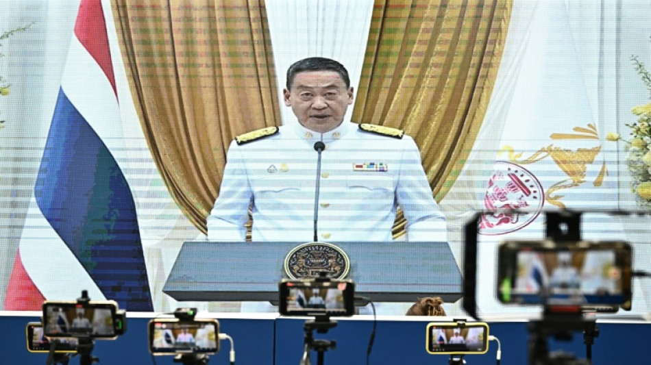 New Thai PM takes office, vows four years of change