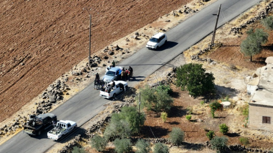Syria troops quit Druze heartland leaving bodies on streets